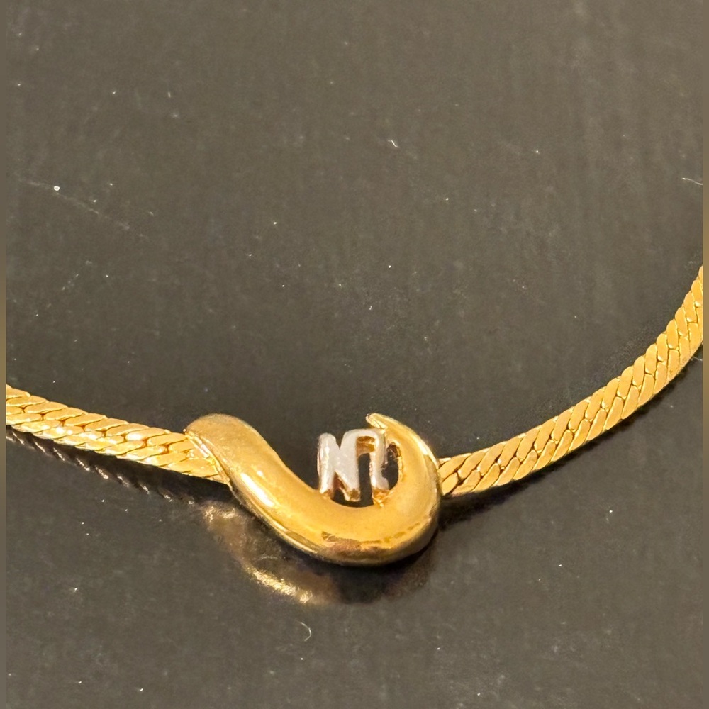 Nina Ricci Gold Necklace with Silver Accent